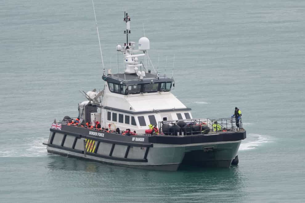 A Border Force vessel carrying migrants (Gareth Fuller/PA)