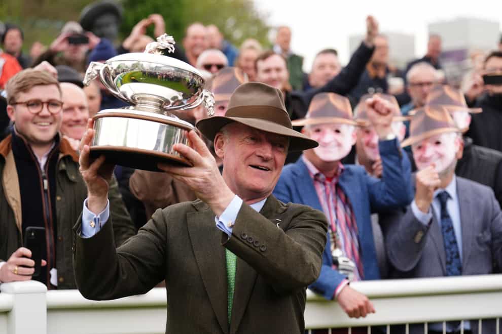 New champion trainer Willie Mullins poses with fans at Sandown (John Walton/PA)