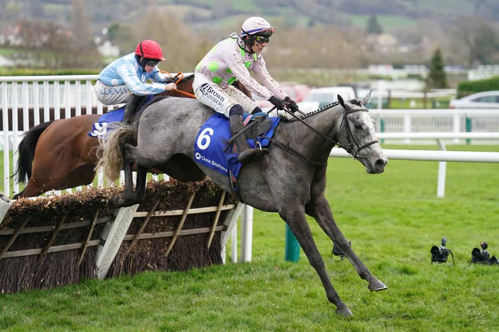 Lossiemouth ridden by Paul Townend on their way to winning the Close Brothers Mares’ Hurdle on day one of the 2024 Cheltenham Festival (Mike Egerton/PA)