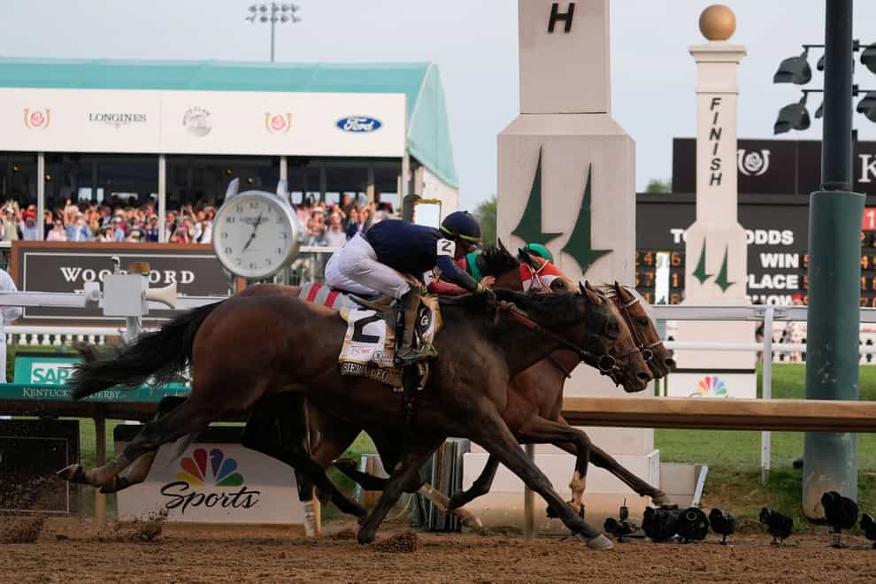 Mystik Dan (far side) just edged out Sierra Leone (near) and Forever Young in the Kentucky Derby (AP Photo/Kiichiro Sato)