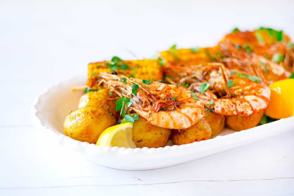 Cajun prawns with potato and corn you can make in the air fryer (SharkNinja/PA)