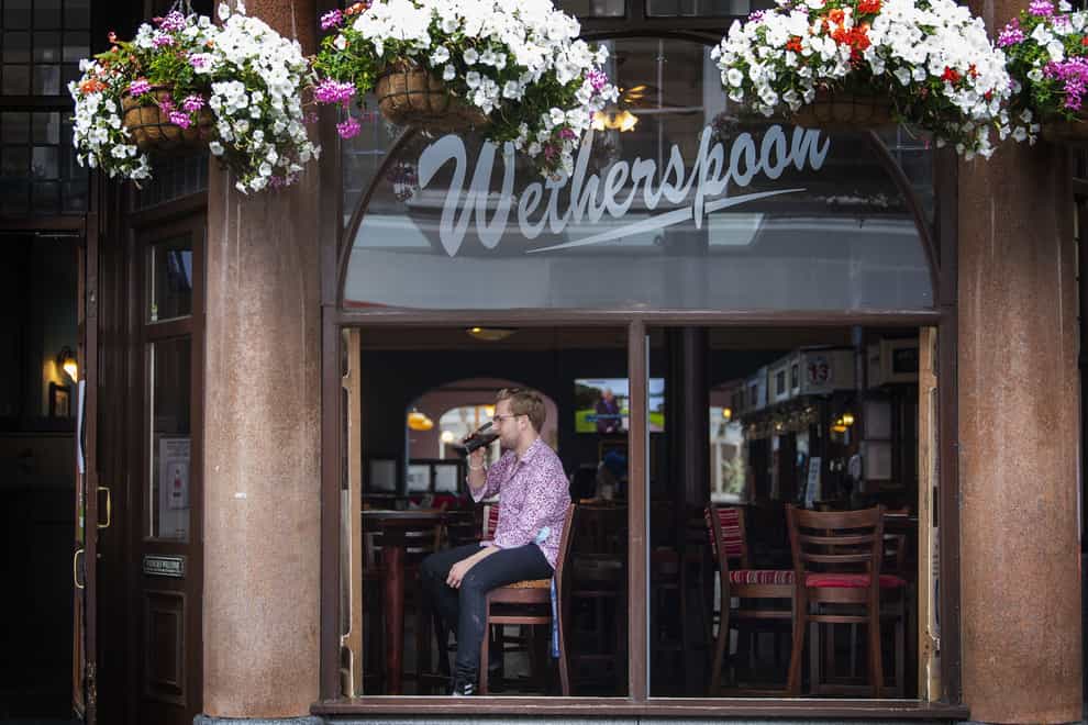 Wetherspoon sales lifted over the past three months as it hailed strong demand for Guinness (Victoria Jones/PA)